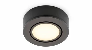 LED puck lights illuminating display shelves