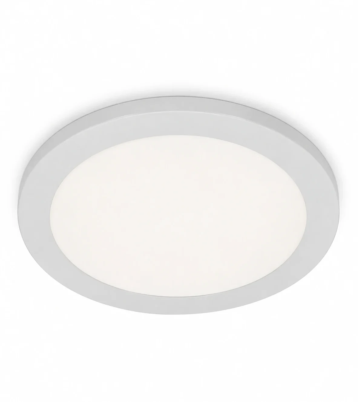 Surface mount LED puck light with diffused lens